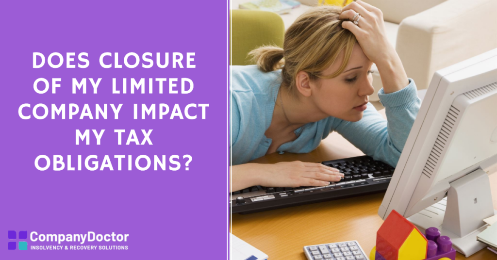 a woman sat at her desk wondering if company closure of limited company affects tax obligations.